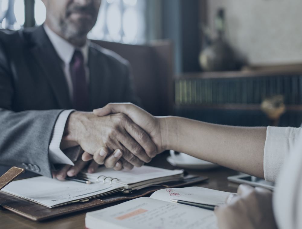 Attorney and client meeting in Houston